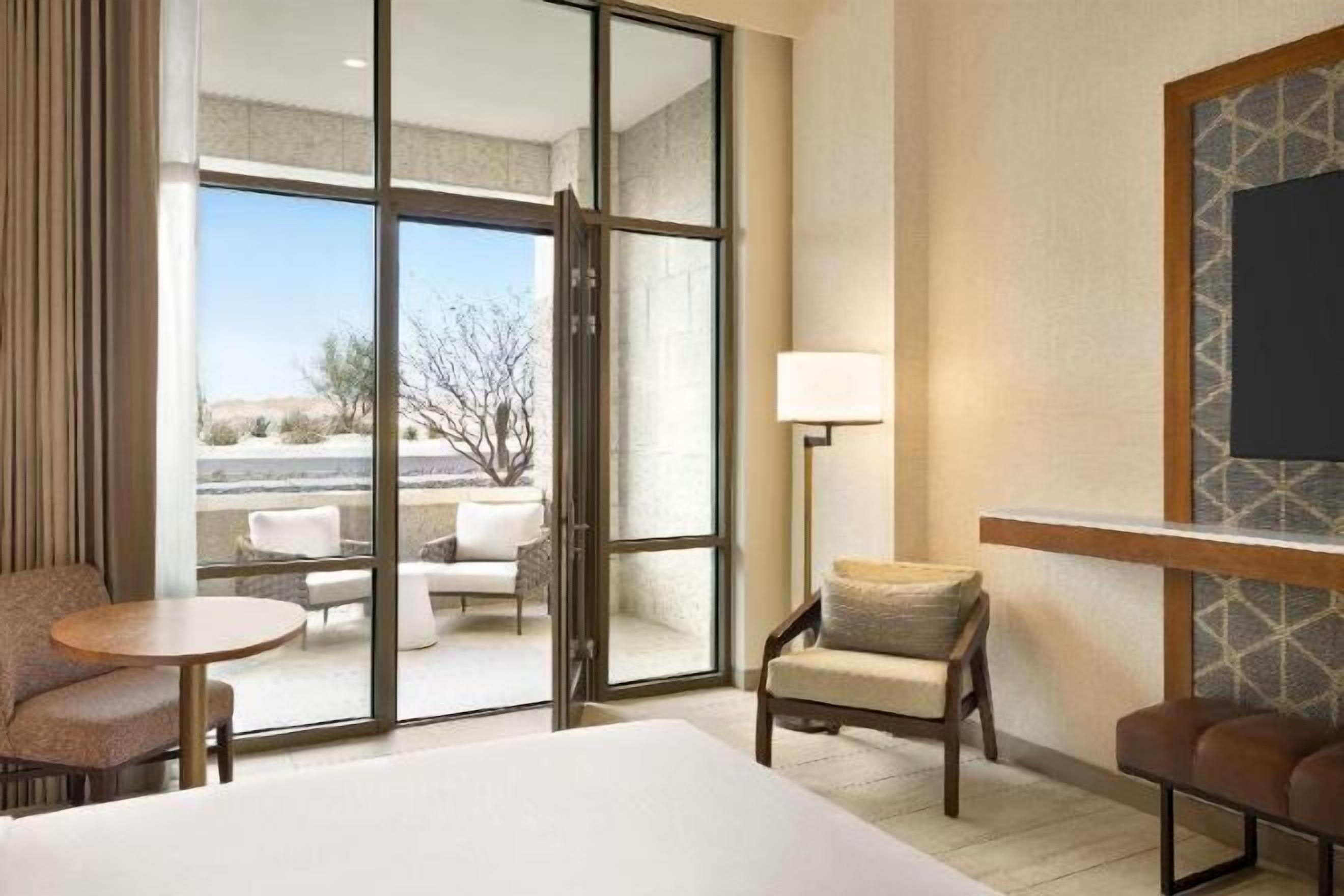 In-room safe, laptop workspace, blackout drapes, soundproofing