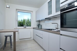 Réfrigérateur, four, plaque de cuisson, lave-vaisselle