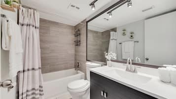 Combined shower/tub