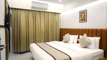Premium Room | Pillow-top beds, in-room safe, individually decorated