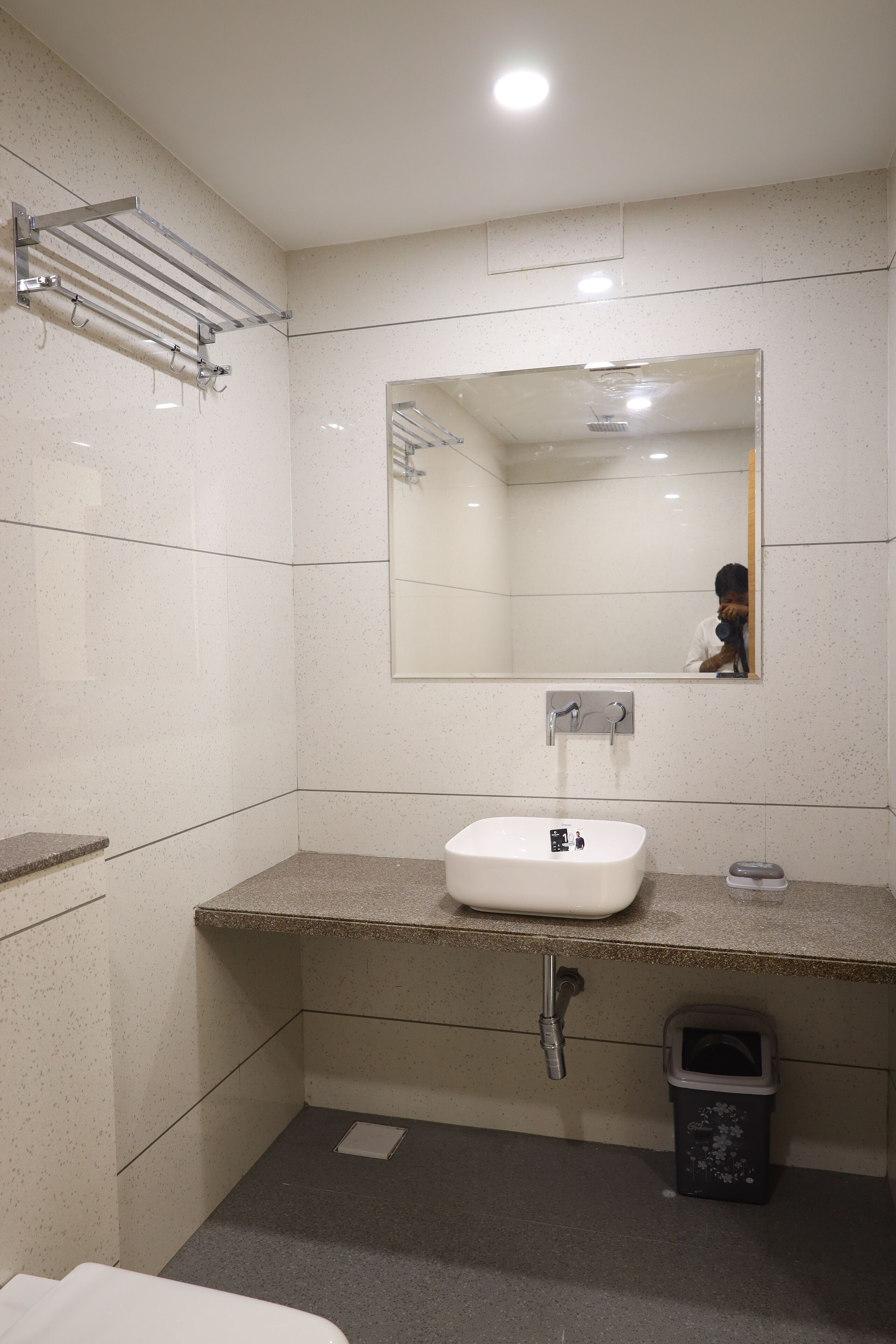 Shower, rainfall showerhead, designer toiletries, hair dryer