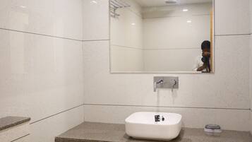 Shower, rainfall showerhead, designer toiletries, hair dryer