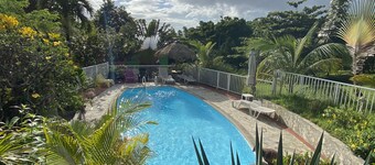 Large bungalow with pool, sea, mountain and garden views.