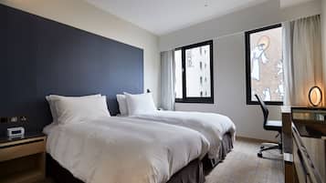 Habitación ejecutiva con 2 camas individuales | Minibar, caja fuerte, escritorio y espacio para trabajar con un portátil
