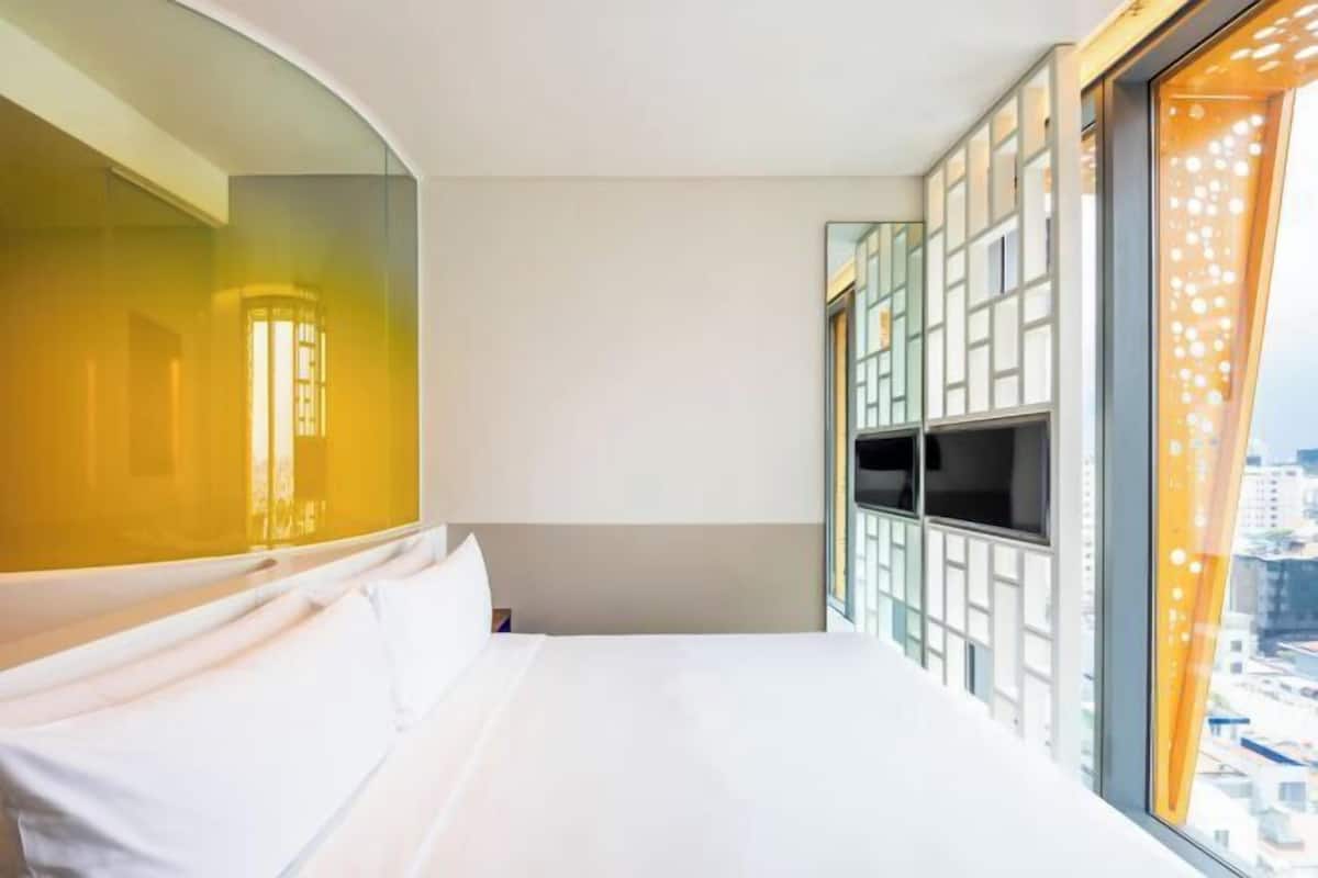 Ropa de cama de alta calidad, camas Select Comfort y minibar