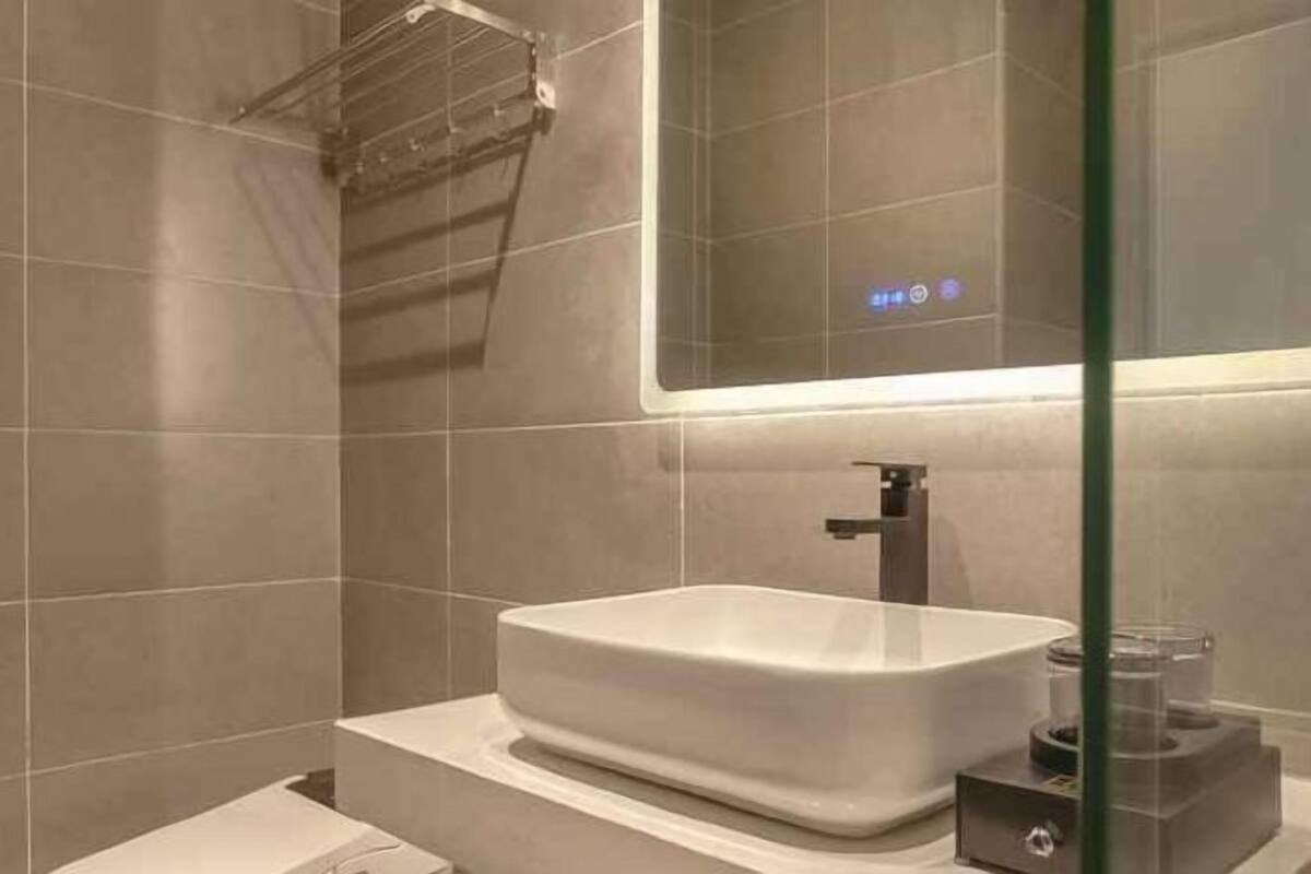 Shower, rainfall showerhead, hair dryer, slippers