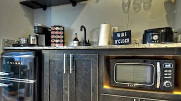 Fridge, microwave, coffee/tea maker, toaster