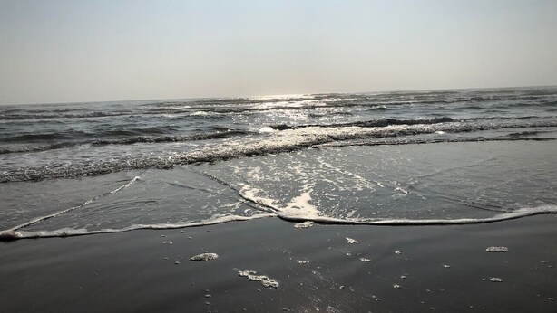 A beach with waves and a clear sky. - Beach Steps Away: Garden Oasis with Pool & Jacuzzi (South Padre Island)