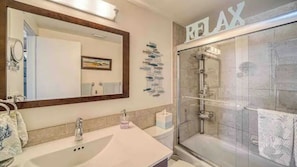 Shower, hair dryer, towels, soap
