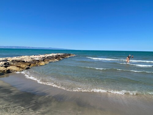 Renovated old farmhouse among olive trees and vineyards with outdoor hot tub