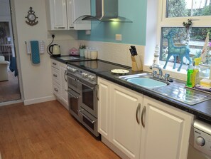 Dishwasher, high chair, cookware/dishes/utensils
