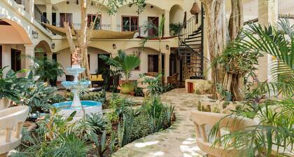 hotel y hostal nojoch che