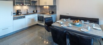 Experience an unforgettable vacation by the North Sea in the spacious Domingo vacation home in Bensersiel! This spacious North Sea Oasis house offers around 120 m² of living space and is the ideal retreat for up to 10 people plus a small child. With...