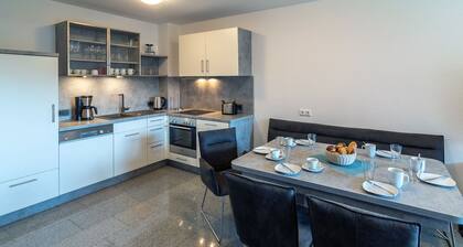 Experience an unforgettable vacation by the North Sea in the spacious Domingo vacation home in Bensersiel! This spacious North Sea Oasis house offers around 120 mÂČ of living space and is the ideal retreat for up to 10 people plus a small child. With...