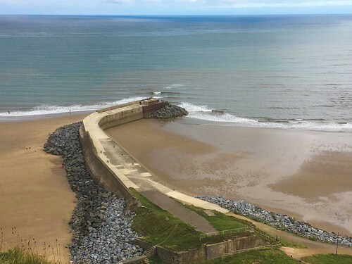 This unique by the coast is a romantic retreat with an artisan feel.