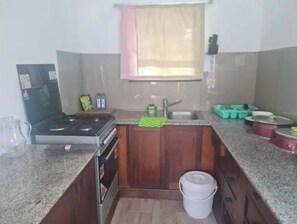 Fridge, microwave, stovetop, electric kettle