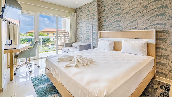 Minibar, desk, laptop workspace, iron/ironing board