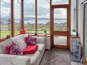 Hillside sunlounge with views over loch Gairloch on the Torridon mountains | Hillside - Gairloch Cottages - Hillside, Gairloch