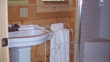 Regadera, tina de hidromasaje, secadora de cabello