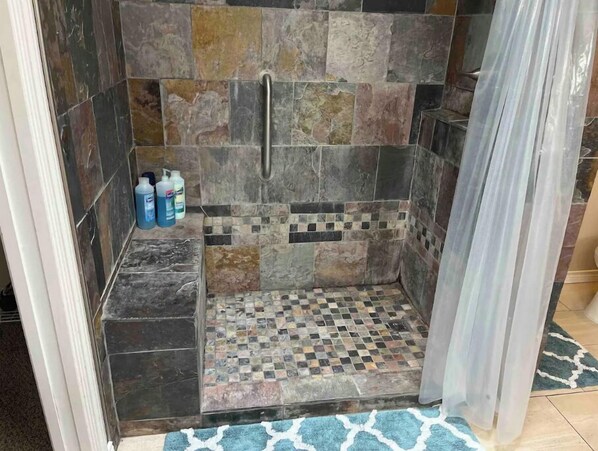 Combined shower/tub, hair dryer, towels, soap