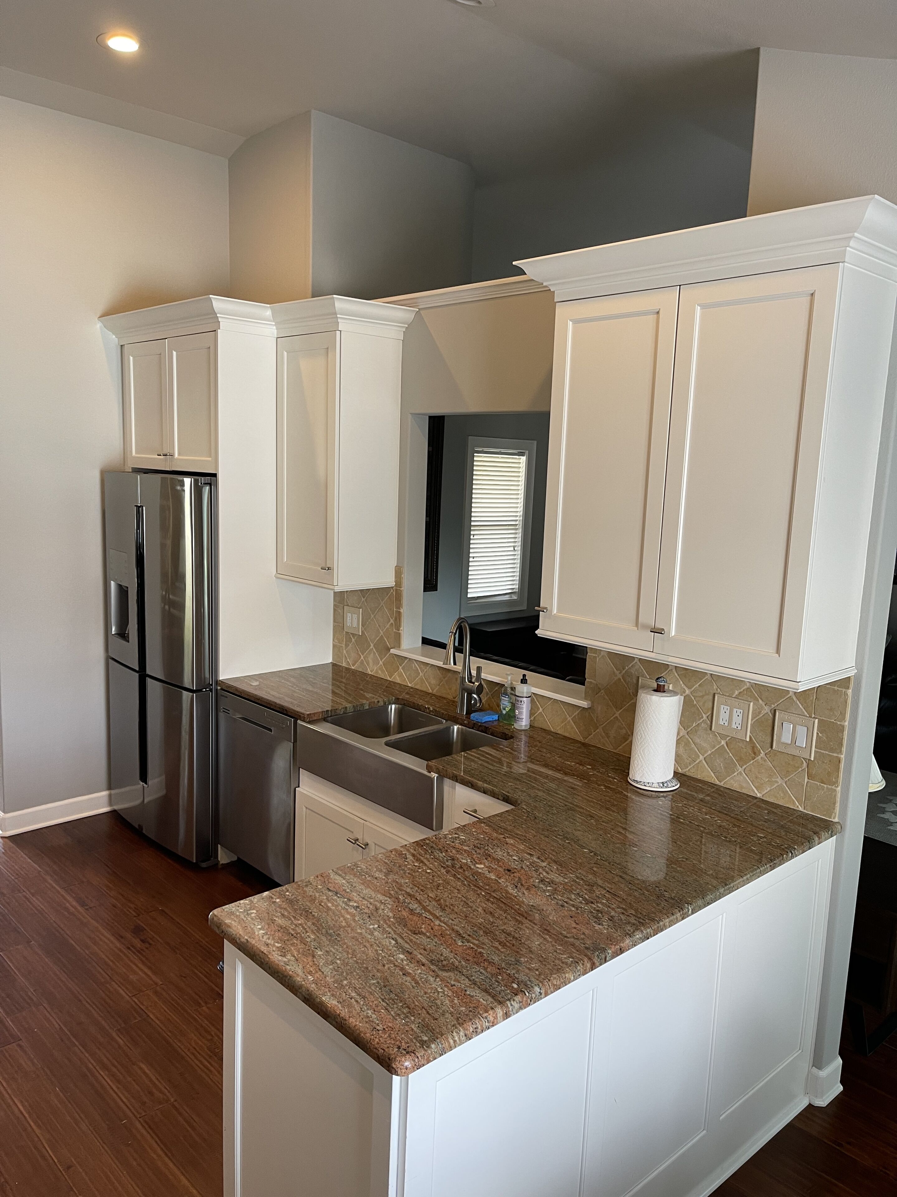Kitchen with stainless steel appliances throughout