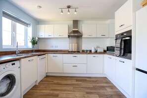 Maison, salle de bains privée | Cuisine partagée | Chaise haute