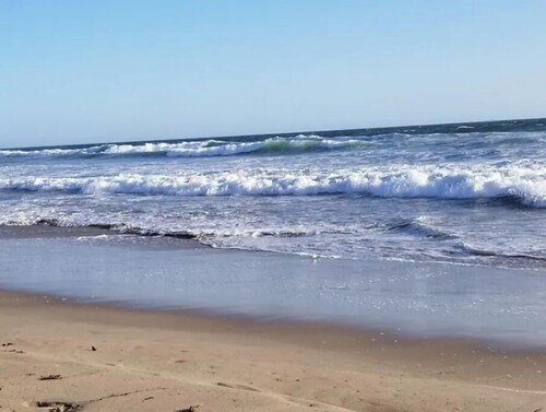 Steps to the Sand! Luxury 2 bdrm Condo with an Ocean View