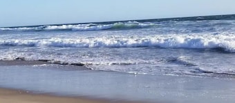Steps to the Sand! Luxury 2 bdrm Condo with an Ocean View
