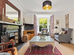 TV, fireplace - 5 bedroom accommodation in Tresaith, near Aberporth (Tresaith, near Aberporth)