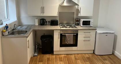 Enjoy a spacious lounge with a cozy sofa bed and a private ensuite bedroom