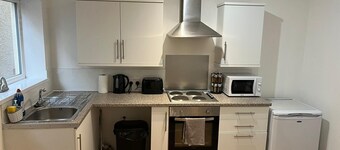 Enjoy a spacious lounge with a cozy sofa bed and a private ensuite bedroom