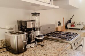 Microwave, oven, stovetop, cookware/dishes/utensils - Luxury Condo, the Hidden gem in Progreso East, Steps From the Beach. Live it! (Progreso)