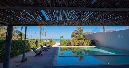 Beachfront 3 BR + Maid Room Modern Condo Private Pool Steps to the Beach