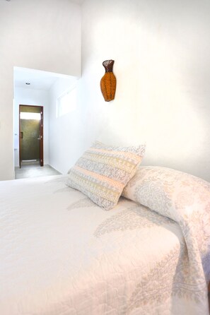 2 bedrooms, laptop workspace, iron/ironing board, bed sheets