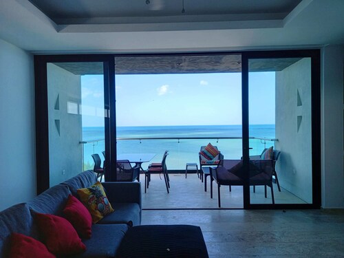 Ocean Views From all the Bedrooms of This Deluxe Beachfront Condo, Paradise