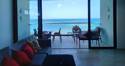 Ocean Views From all the Bedrooms of This Deluxe Beachfront Condo, Paradise