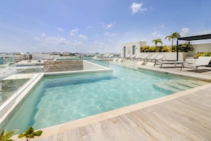 Outdoor pool, a rooftop pool - Beautiful Veranto Condo Living! 2 BR Paradise Oasis With Private Jacuzzi, Gym, Pool and Parking ! (Playa del Carmen)