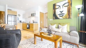 Living area - Brand New-modern Scaped 2 BR Condo in the new Heart of Playa del Carmen!!! Sleeps 4 (Playa del Carmen)