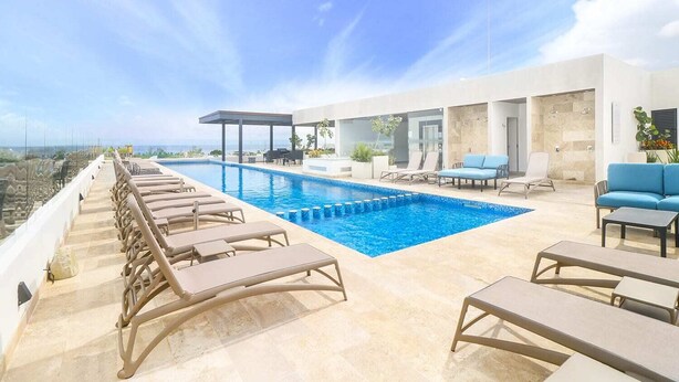 Pool - Brand New-modern Scaped 2 BR Condo in the new Heart of Playa del Carmen!!! Sleeps 4 (Playa del Carmen)