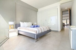 3 bedrooms, premium bedding, laptop workspace, iron/ironing board