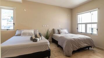 3 bedrooms, laptop workspace, iron/ironing board, bed sheets