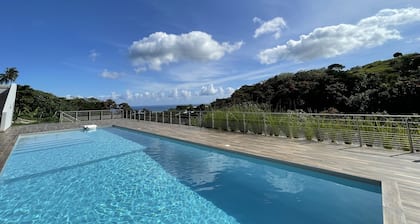 Mititai condo, sea view & pool, the quiet place near the airport