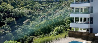 Mititai condo, sea view & pool, the quiet place near the airport