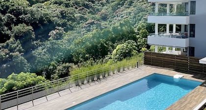 Appartement Mititai, vue mer et piscine au calme, à proximité de Papeete