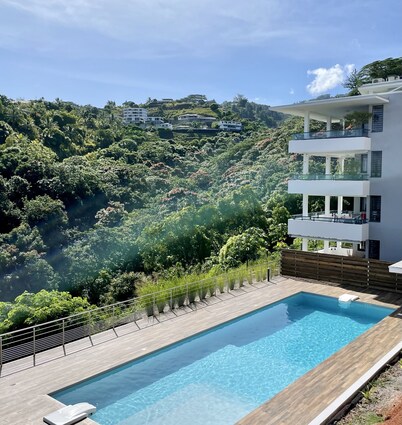 Mititai condo, sea view & pool, the quiet place near the airport