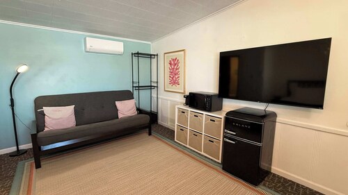 Single King Room w/ Sleeper Sofa (main level)