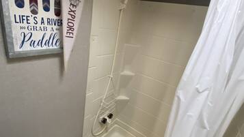 Shower, towels, soap, shampoo