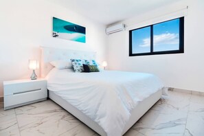 3 habitaciones, tabla de planchar con plancha y ropa de cama 