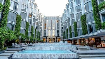 Outdoor pool, open 7:00 AM to 8:00 PM, pool umbrellas, pool loungers