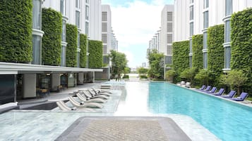 Outdoor pool, open 7:00 AM to 8:00 PM, pool umbrellas, pool loungers